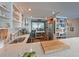 Bright kitchen featuring stainless steel appliances, open shelving, and modern countertops at 1510 1St W Ave # 102, Bradenton, FL 34205