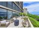 Expansive patio with comfortable seating, and stunning water views of marina at 1510 1St W Ave # 102, Bradenton, FL 34205