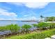 Scenic water view of a marina with boats and lush greenery on a sunny day at 1510 1St W Ave # 102, Bradenton, FL 34205