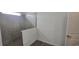 Modern bathroom with gray tiled shower and clear glass partition wall at 15115 Oxford Grey Dr, Bradenton, FL 34211