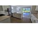 Spacious kitchen with a large island, stainless steel appliances, and an open layout at 15115 Oxford Grey Dr, Bradenton, FL 34211