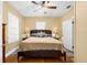 Bright bedroom featuring a ceiling fan, warm colors, and ample natural light at 1911 26Th W St, Bradenton, FL 34205