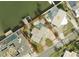 Aerial view shows a home with a pool and waterfront access at 205 55Th Ave, St Pete Beach, FL 33706