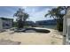 Backyard features a pool, spa, and waterfront views at 205 55Th Ave, St Pete Beach, FL 33706