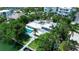 Sprawling estate with a pool, dock, and lush greenery at 259 S Polk Dr, Sarasota, FL 34236