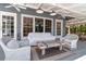 Inviting covered patio with comfortable seating, perfect for relaxing outdoors at 259 S Polk Dr, Sarasota, FL 34236