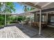Spacious covered patio perfect for outdoor dining and entertaining with waterfront views at 259 S Polk Dr, Sarasota, FL 34236