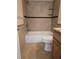 Bathroom featuring tiled shower and granite countertops with a white toilet at 2606 29Th Ave W # 12, Bradenton, FL 34205
