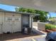 Exterior view of the side of the home and adjacent covered parking area at 2606 29Th Ave W # 12, Bradenton, FL 34205