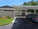 Exterior view of the home with carport and well-kept landscaping at 2606 29Th Ave W # 12, Bradenton, FL 34205