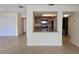 A view of the kitchen with wood cabinets and granite countertops at 2606 29Th Ave W # 12, Bradenton, FL 34205