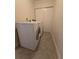 Well-equipped laundry area with appliances, closet and neutral finishes for a clean and efficient space at 2606 29Th Ave W # 12, Bradenton, FL 34205