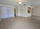 Spacious living room with tile floors and neutral walls, perfect for entertaining at 2606 29Th Ave W # 12, Bradenton, FL 34205