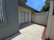 View of a patio with a sliding glass door and lattice fence at 2606 29Th Ave W # 12, Bradenton, FL 34205