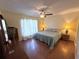 Cozy bedroom with a ceiling fan and an ensuite bath at 3810 75Th W St # 137, Bradenton, FL 34209
