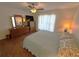 Bedroom featuring hardwood floors and a ceiling fan at 3810 75Th W St # 137, Bradenton, FL 34209