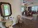 Clubhouse room with plenty of seating, a large mirror, and a beautiful view of the complex at 3810 75Th W St # 137, Bradenton, FL 34209