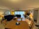 Open concept living and dining area filled with natural light at 3810 75Th W St # 137, Bradenton, FL 34209