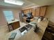 Functional kitchen with a breakfast bar, stainless steel appliances, and ample cabinet space at 3810 75Th W St # 137, Bradenton, FL 34209