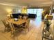 Bright living room with comfortable seating and a dining area provides ample space to relax at 3810 75Th W St # 137, Bradenton, FL 34209