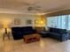 Cozy living room with neutral walls, tile floors and modern furnishings at 3810 75Th W St # 137, Bradenton, FL 34209