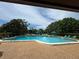 Community pool features a lounging area, tables and chairs and clear blue water for those hot summer days at 3810 75Th W St # 137, Bradenton, FL 34209