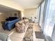 Comfortable sunroom with tiled flooring and a view into the living area at 3810 75Th W St # 137, Bradenton, FL 34209