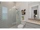 Clean bathroom featuring a modern glass shower, decorative tile, and gray countertops at 3936 Santa Caterina Blvd, Bradenton, FL 34211
