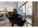 Bright living room featuring a grand piano, large windows and views to outdoor oasis at 3936 Santa Caterina Blvd, Bradenton, FL 34211