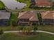 Aerial view showcasing the backyard with pool and screened-in lanai of a beautiful home at 3936 Santa Caterina Blvd, Bradenton, FL 34211