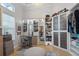Spacious walk-in closet with custom shelving, storage, and a vanity area at 3936 Santa Caterina Blvd, Bradenton, FL 34211
