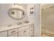 Renovated bathroom with a modern vanity, custom lighting, and tiled shower at 4380 Exeter Dr # 204, Longboat Key, FL 34228