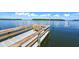 Relaxing community dock offers residents a serene waterfront setting to enjoy the view at 4380 Exeter Dr # 204, Longboat Key, FL 34228