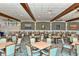 Spacious dining room featuring neutral decor and table seating, perfect for a community center at 4380 Exeter Dr # 204, Longboat Key, FL 34228