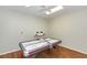 Entertainment room with air hockey on wood floors, offering leisure and recreational activities at 4380 Exeter Dr # 204, Longboat Key, FL 34228