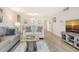 Bright living room featuring contemporary decor, plush seating, and sleek, modern furnishings at 4380 Exeter Dr # 204, Longboat Key, FL 34228
