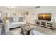 Inviting living room with neutral tones, comfortable seating, and stylish decor at 4380 Exeter Dr # 204, Longboat Key, FL 34228
