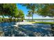 Enjoy outdoor games on this community shuffleboard court with a scenic waterfront view at 4380 Exeter Dr # 204, Longboat Key, FL 34228