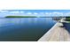 Picturesque waterfront view showcasing the tranquil scenery of the ocean and lush islands on the horizon at 4380 Exeter Dr # 204, Longboat Key, FL 34228