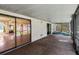 An ample covered patio with access to the backyard and living room, ideal for outdoor entertaining at 4805 Cypress Lake Ct, Sarasota, FL 34243