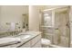 Bathroom with glass shower, granite counter tops, and modern finishes at 4916 Tivoli Run, Bradenton, FL 34211