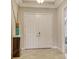 Beautiful foyer featuring a double door entrance, tile floor and modern decor at 4916 Tivoli Run, Bradenton, FL 34211