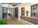The grand lobby boasts elegant decor, a decorative ceiling, and stylish furnishings, creating a welcoming atmosphere at 4916 Tivoli Run, Bradenton, FL 34211
