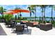 Inviting outdoor patio seating area with picturesque waterfront views at 4916 Tivoli Run, Bradenton, FL 34211