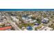 Wide aerial view of a coastal community featuring waterfront properties with canals and boat access at 522 Pine Ave # 8B, Anna Maria, FL 34216