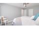 Modern bedroom featuring a closet and a door leading to an en-suite bathroom at 522 Pine Ave # 8B, Anna Maria, FL 34216