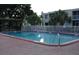 Enjoy a refreshing swim in the community pool surrounded by a well-maintained patio and lush landscaping at 5310 26Th W St # 1002, Bradenton, FL 34207