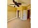 Bedroom with ceiling fan and closet at 5620 Whitehead St, Bradenton, FL 34203