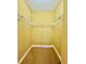 Spacious walk-in closet with shelving is ready for storage at 5620 Whitehead St, Bradenton, FL 34203