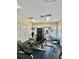 Community gym showcasing a variety of modern exercise equipment and ample lighting at 5620 Whitehead St, Bradenton, FL 34203
